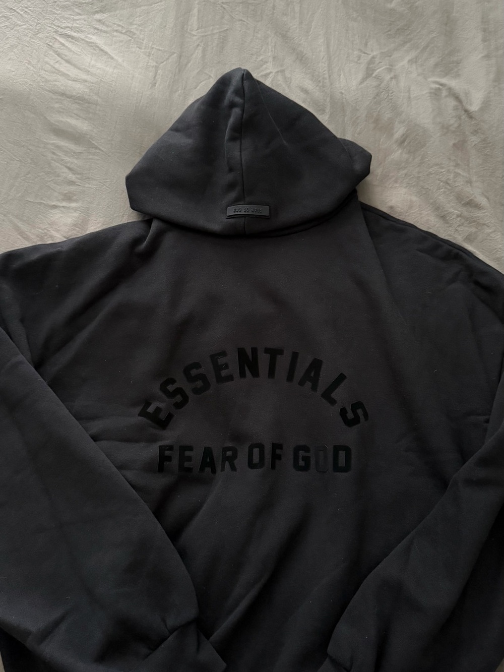 Fear of God Essentials Black Hoodie with Arch Logo